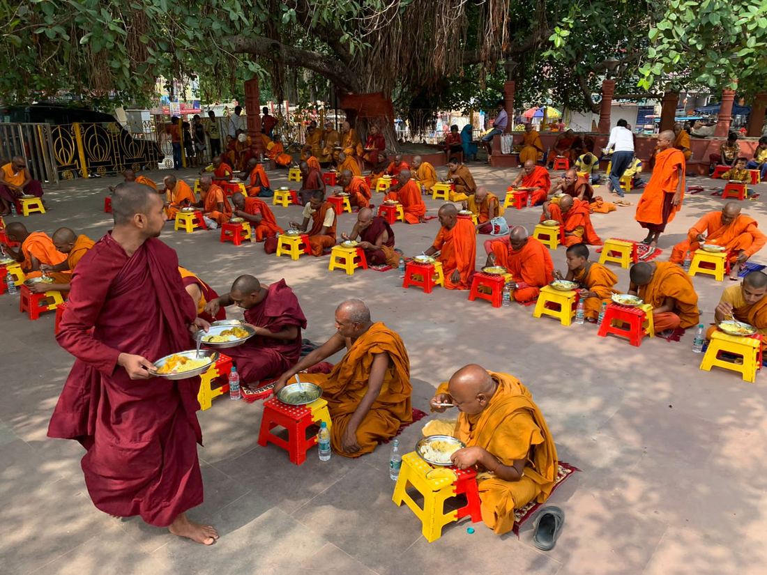 Monks sharing a meal together in Bodh Gaya
